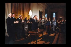 President Jimmy Carter celebrates after signing the Alaska National Interest Conservation Act on December 2, 1980. Jimmy Carter Presidential Library photo.