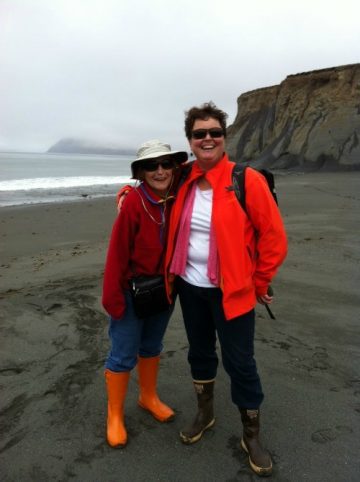 Vicki Clark on a Kodiak beach with Legal Director Valerie Brown mother.