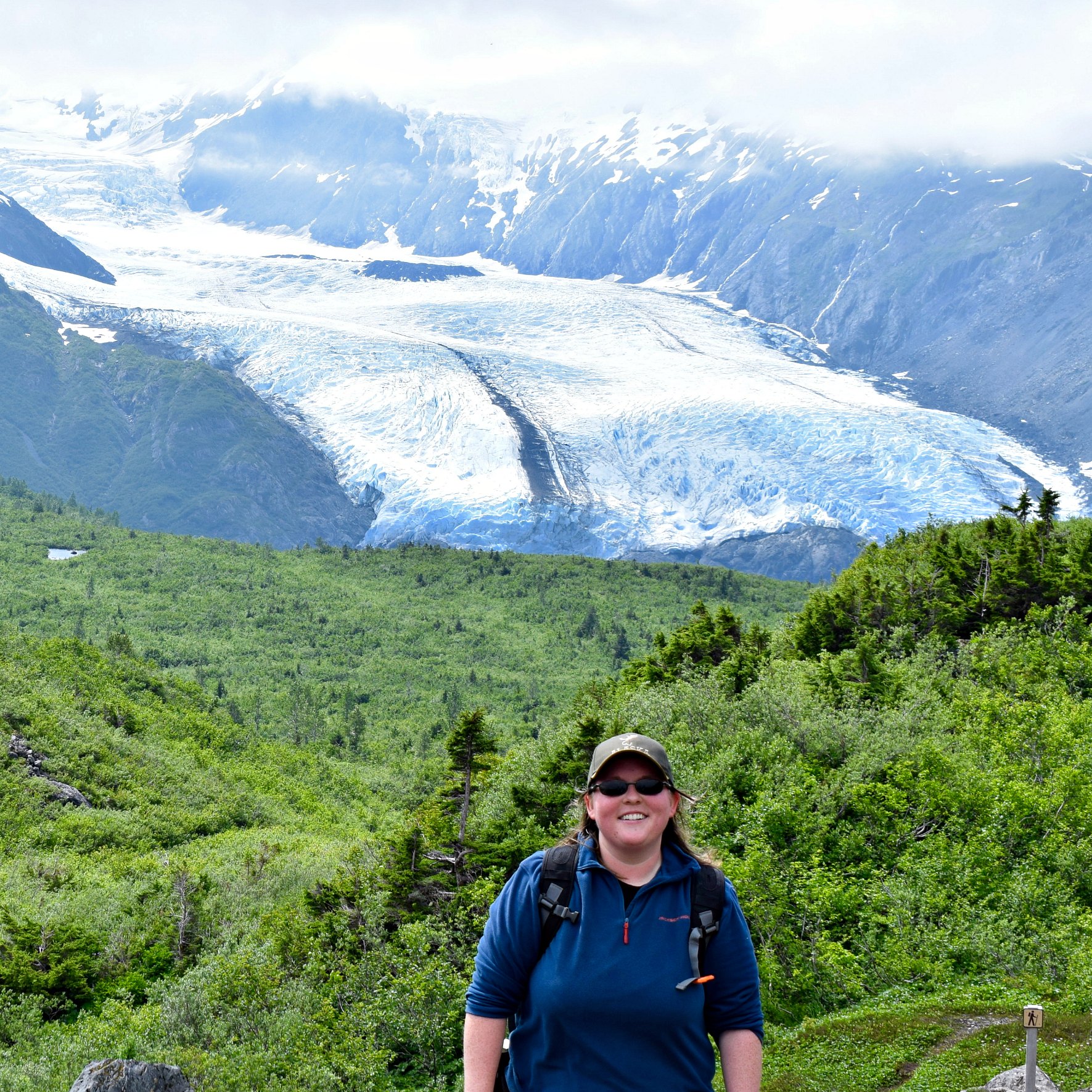 Photo of Catherine Danley in front of Portage Pass glacier. Catherine interned for Trustees this summer.