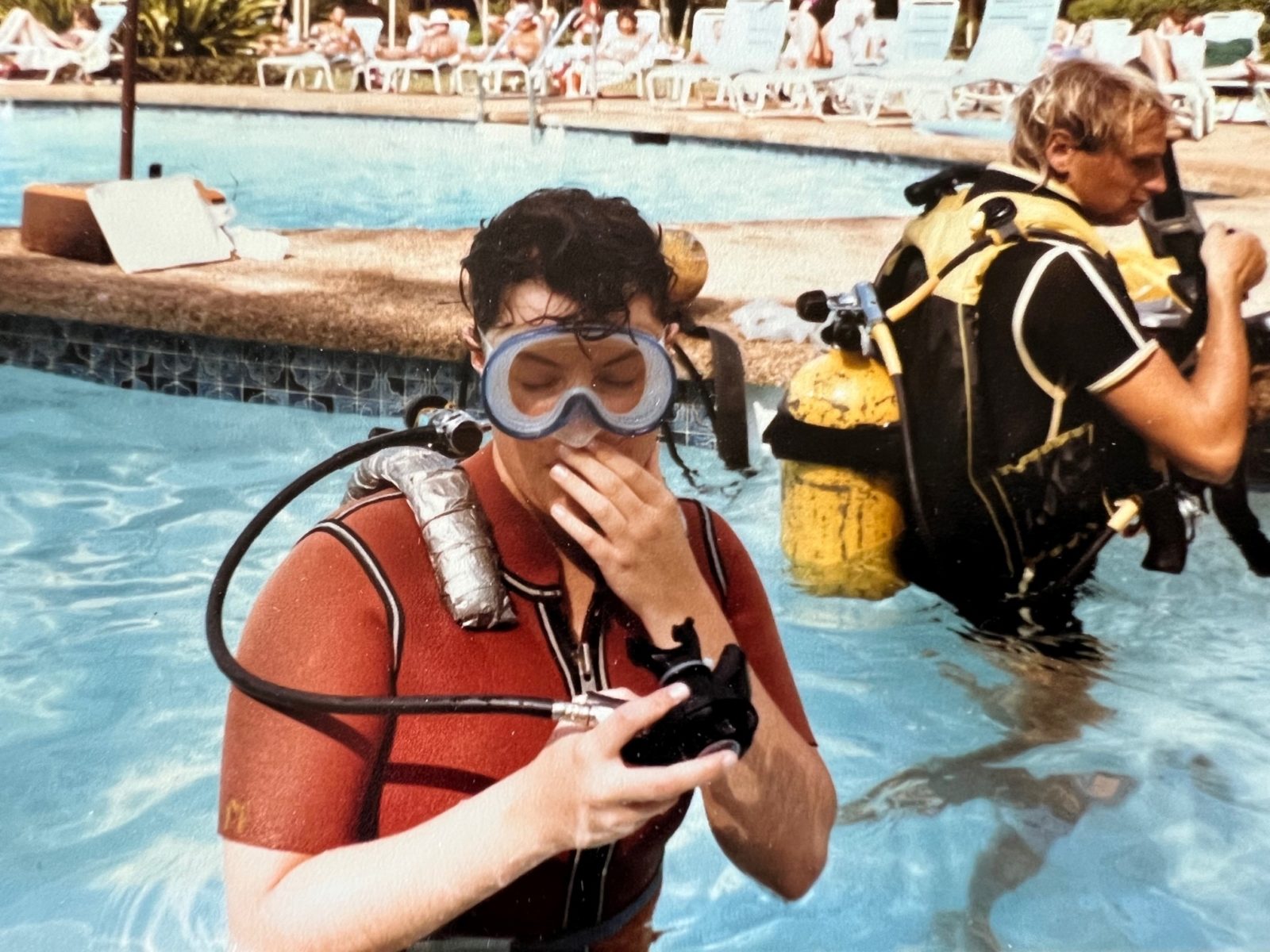 Vicki learning to explore the other world underwater. Her first scuba diving experience in 1991.