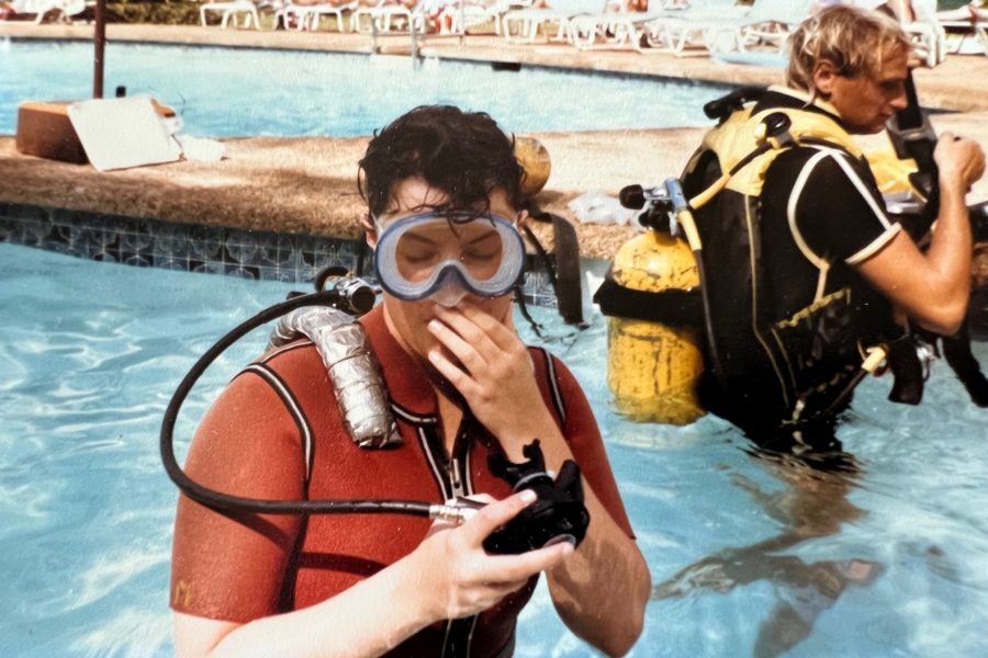 Vicki doing a pool dive while learning to scuba dive--her pathway to the other world.